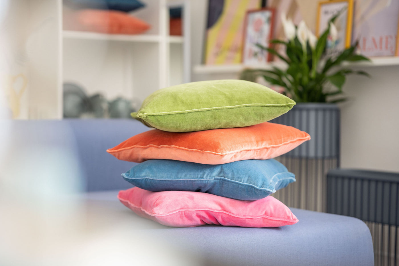 stack of colourful velvet cushions by Bungalow Denmark