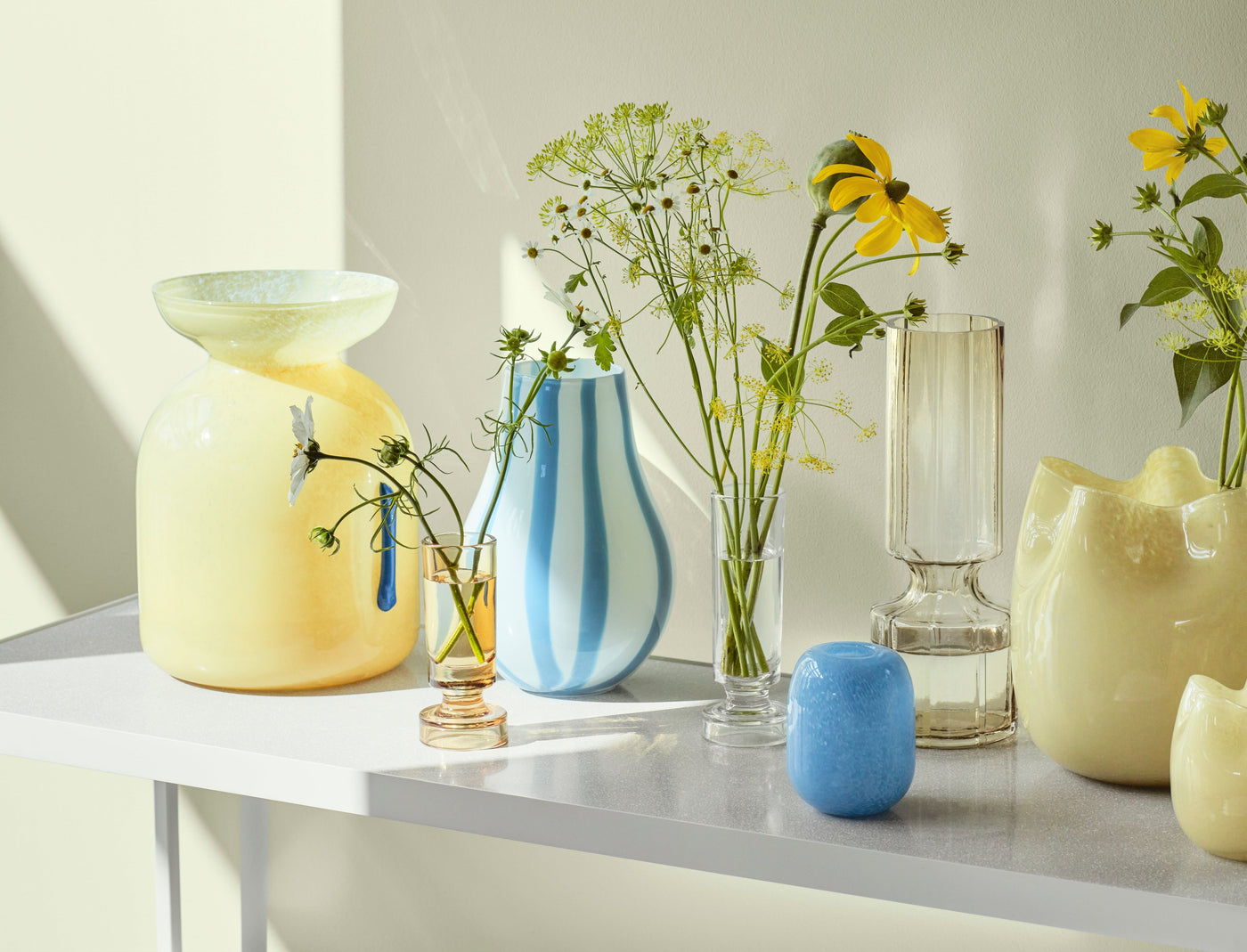 Broste Copenhagen UK Stockist - blue and yellow vases on a table