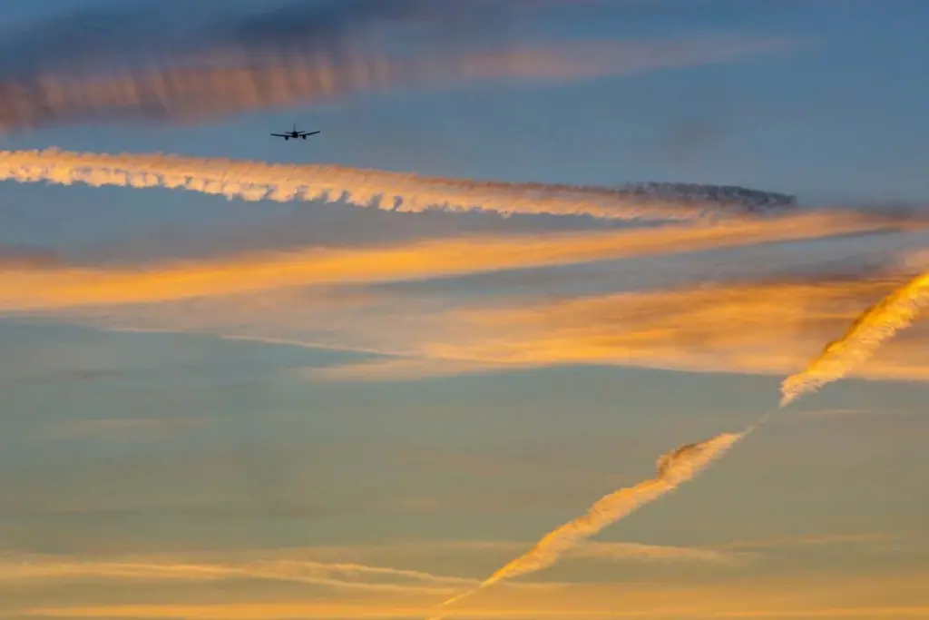AI-Guided Flights Significantly Reduce Contrail Formation and Global Warming Impact