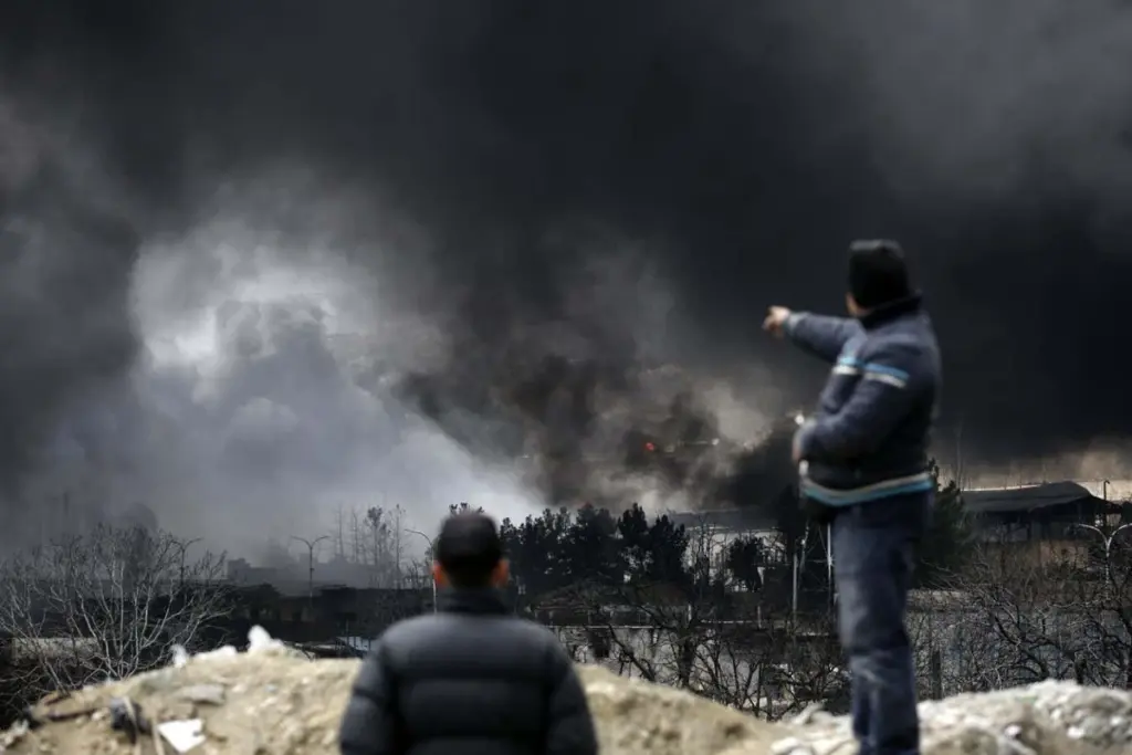 Iran Oil Fires Trigger Hazardous Black Rain and Health Concerns