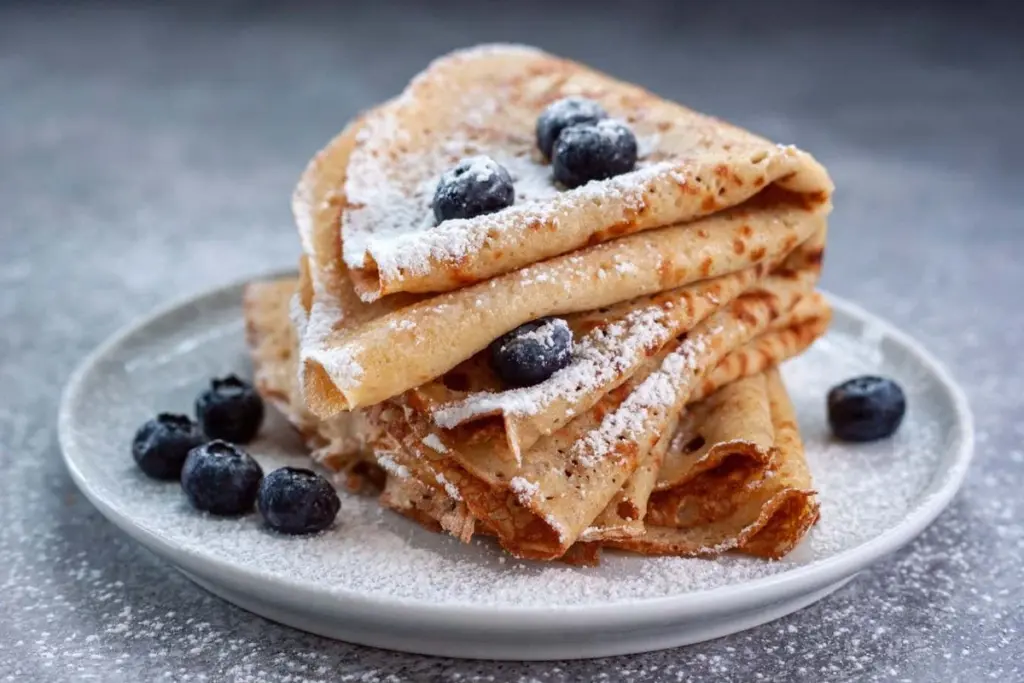 The Physics of Folding: Unraveling Crêpe Behavior with a Single Number